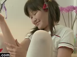 Amazing oriental teen petite plays with dildo