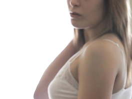 Young beauty plays with sweet pussy on the couch